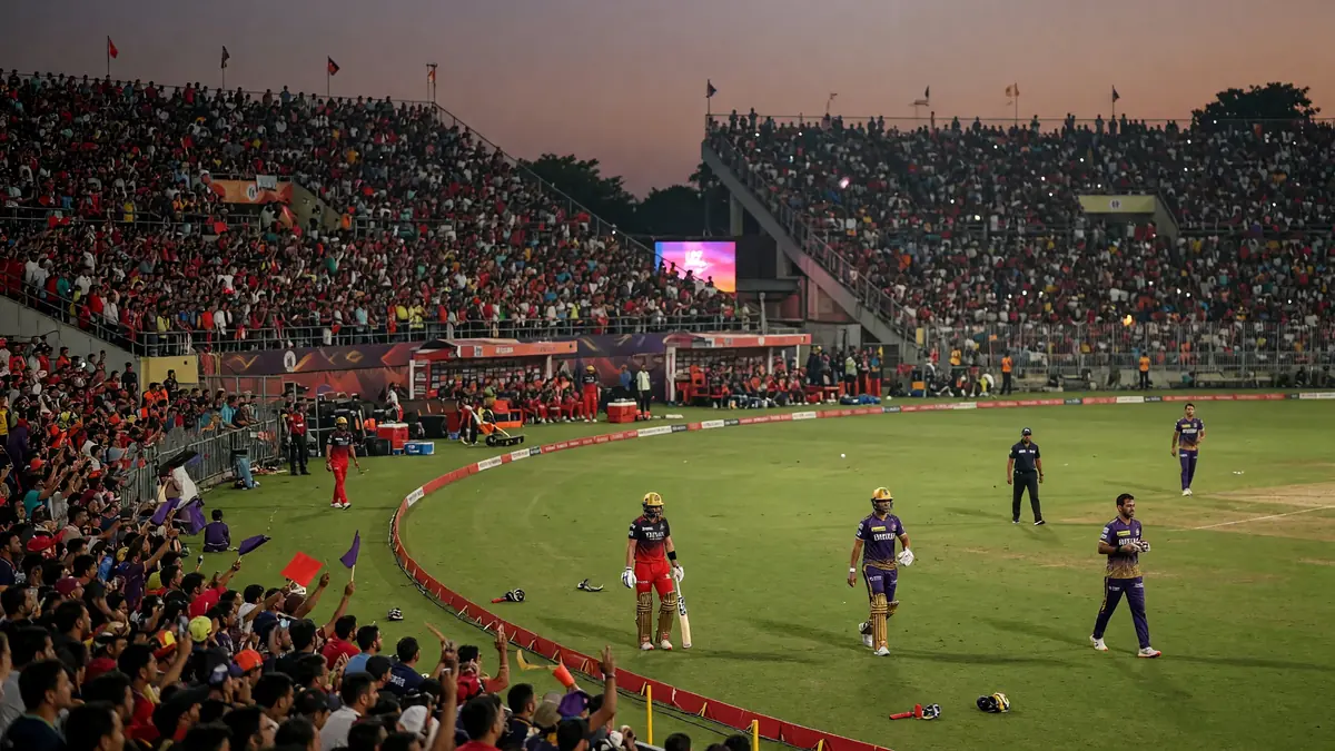 Evening cricket stadium atmosphere with floodlights, crowd stands and the playing surface ready for an IPL match